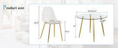 A modern minimalist style round transparent tempered glass table with gold metal legs