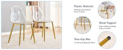 A modern minimalist style round transparent tempered glass table with gold metal legs